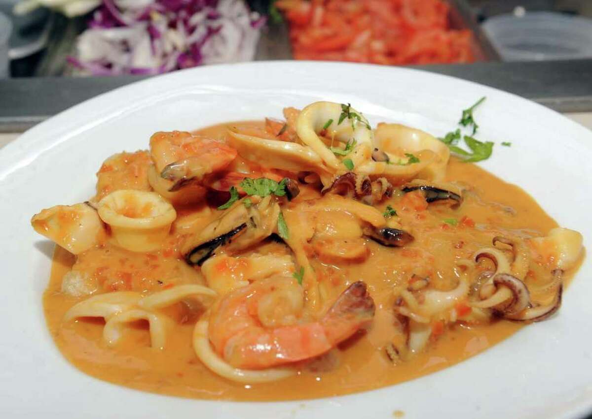 Pescado a lo macho, a Peruvian-style fish stew seasoned with herbs, is on the menu at Empire of the Incas on Main Street in Danbury. Photo taken Thursday, May 5, 2011.