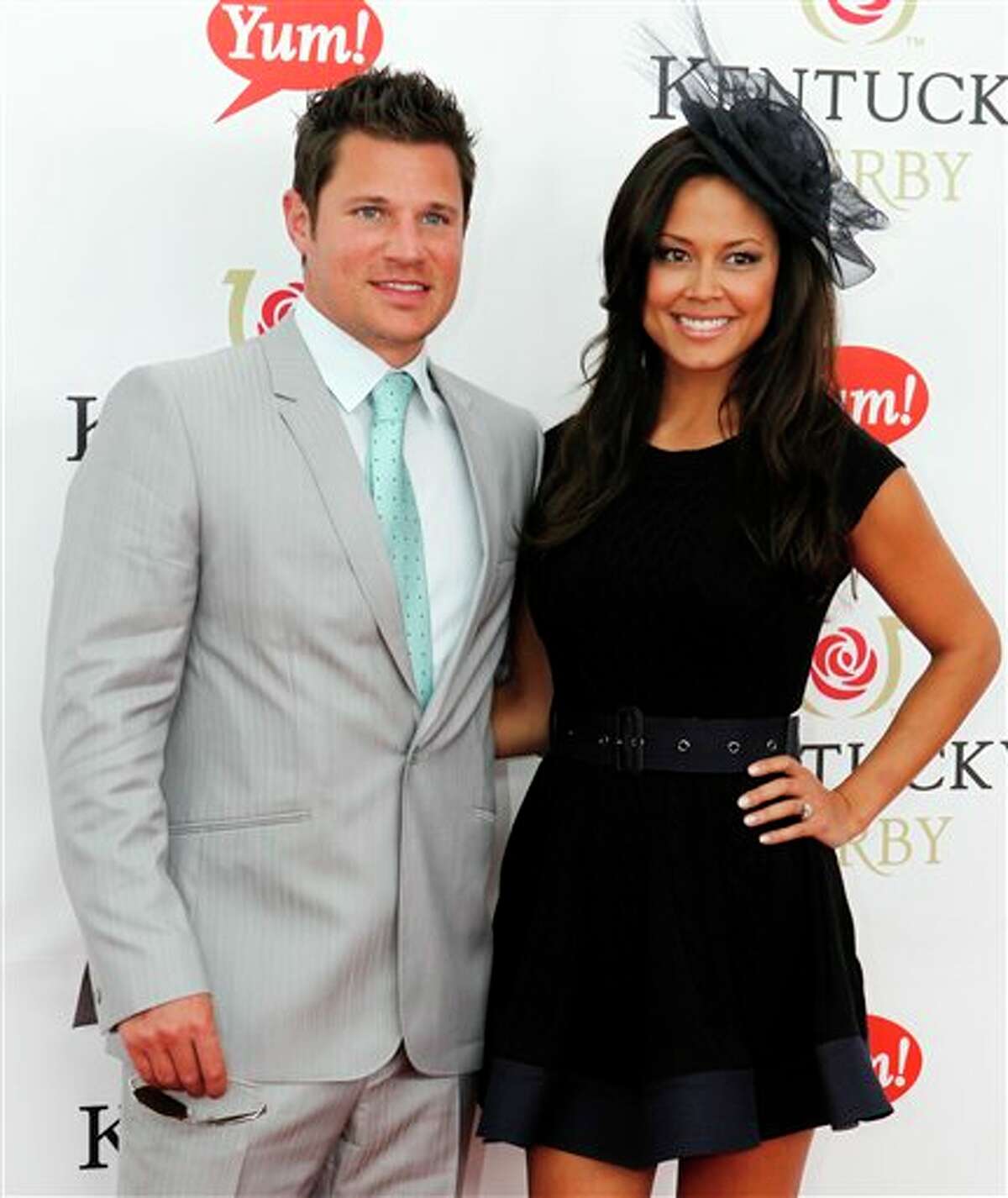 Nick Lachey and fiancee Vanessa Minnillo arrive for the 137th Kentucky Derby horse race at Churchill Downs on Saturday. DARRON CUMMINGS/ASSOCIATED PRESS