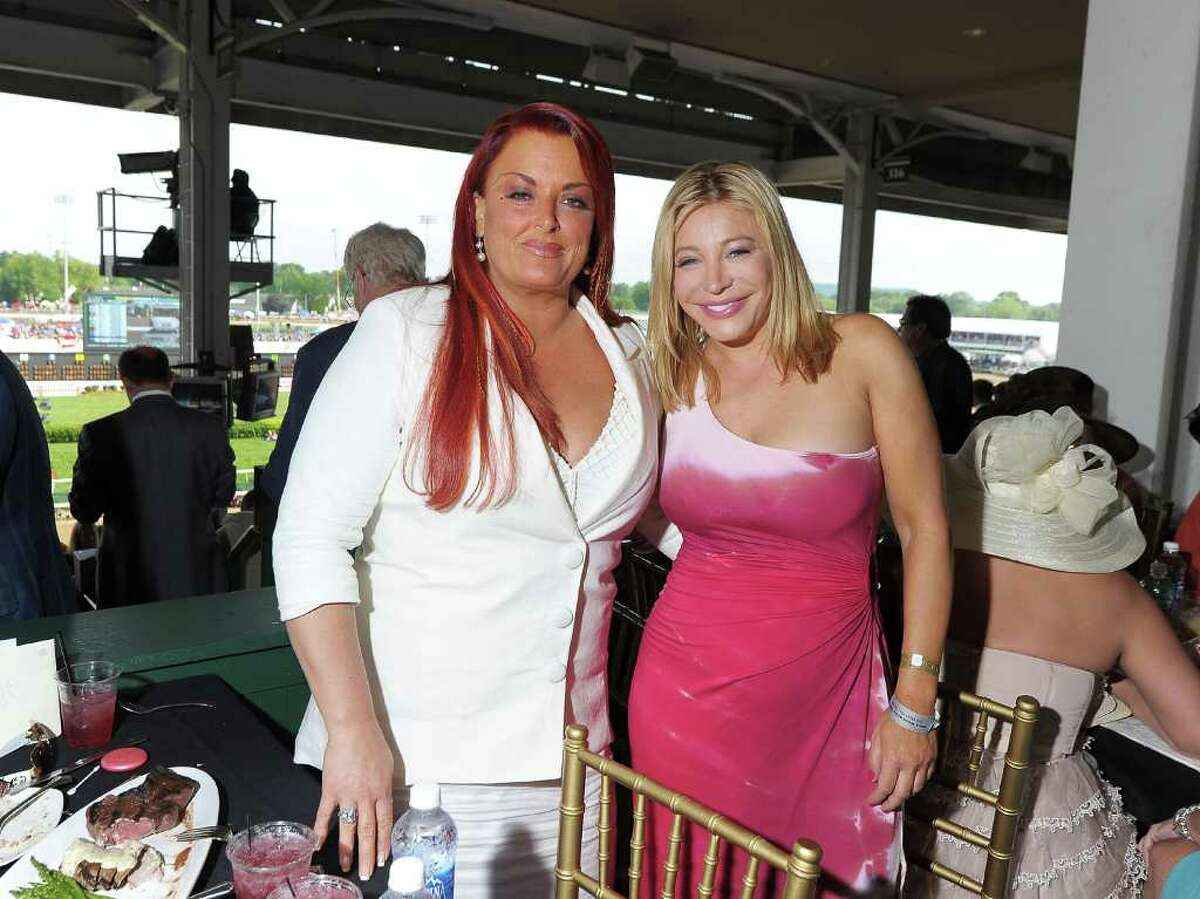 Singers Wynonna Judd (L) and Taylor Dayne attend the 137th Kentucky Derby at Churchill Downs on May 7, 2011 in Louisville, Kentucky. (Photo by Michael Loccisano/Getty Images) *** Local Caption *** Wynonna Judd;Taylor Dayne;