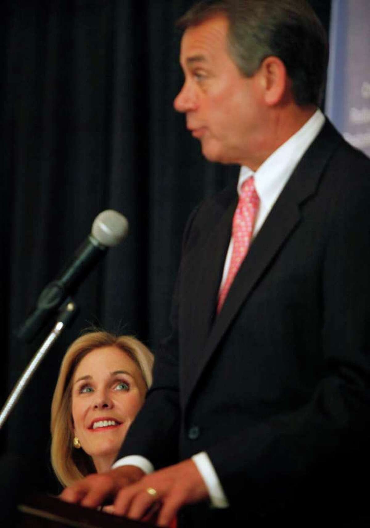 Speaker of the House John Boehner, right, R-Ohio, speaks as Republican candidate for the 26th District Congressional seat Jane Corwin, left, listens during a fundraiser in Depew, N.Y. Monday, May 9, 2011. Three candidates running for New York's open upstate congressional seat will debate for the first time next week. Democrat Kathleen Hochul (HOH'-kuhl), Republican Jane Corwin and Tea Party candidate Jack Davis will meet in Buffalo May 12. (AP Photo/David Duprey)