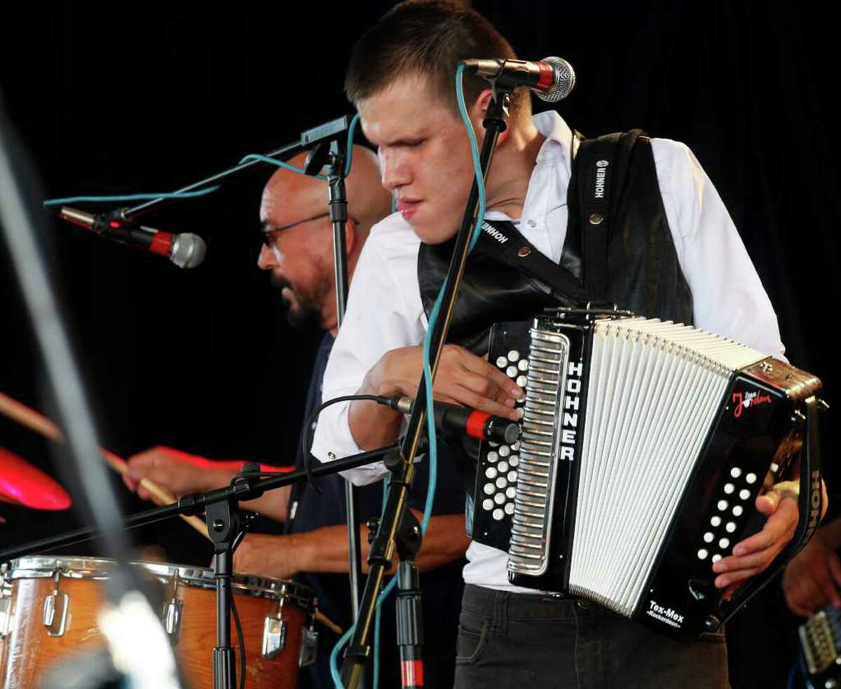 Juanito Castillo y Grupo Inovacion, a 22-year-old accordion protégé of the late Esteban "Steve" Jordan, performs at the 30th Annual Tejano Conjunto Festival at Rosedale Park in May.