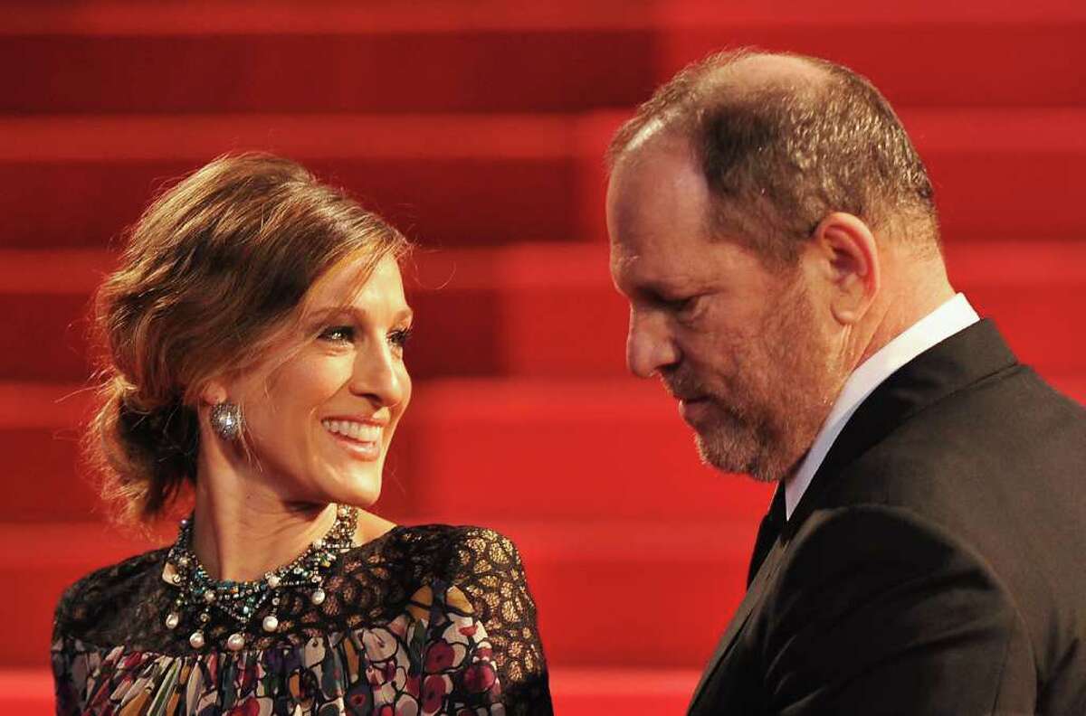 Actress Sarah Jessica Parker (L) and Producer Harvey Weinstein attend the "Wu Xia" premiere at the Palais des Festivals during the 64th Cannes Film Festival on May 13, 2011 in Cannes, France.