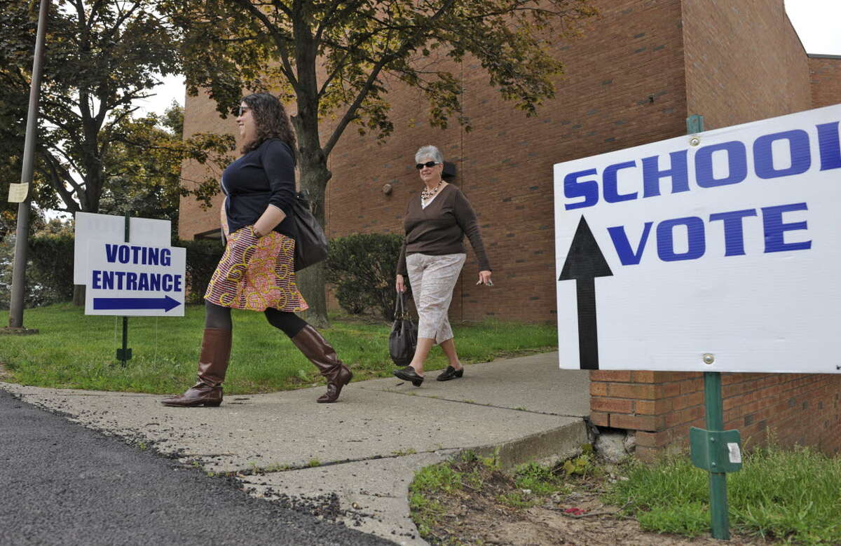 Times Union archive. Monica (l) and Karen (r) Mercado leave the School Budget polling place at the Albany High School in Albany, New York May 18, 2010. ( Skip Dickstein / Times Union)