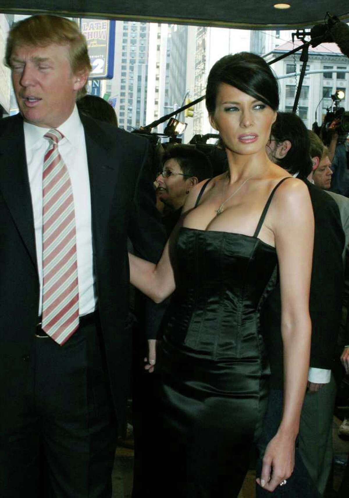 Billionaire developer Donald Trump and model Melania Knauss arrive at the opening night performance of "Bombay Dreams" at the Broadway Theatre Thursday, April 29, 2004 in New York. The pair were engaged on Monday.