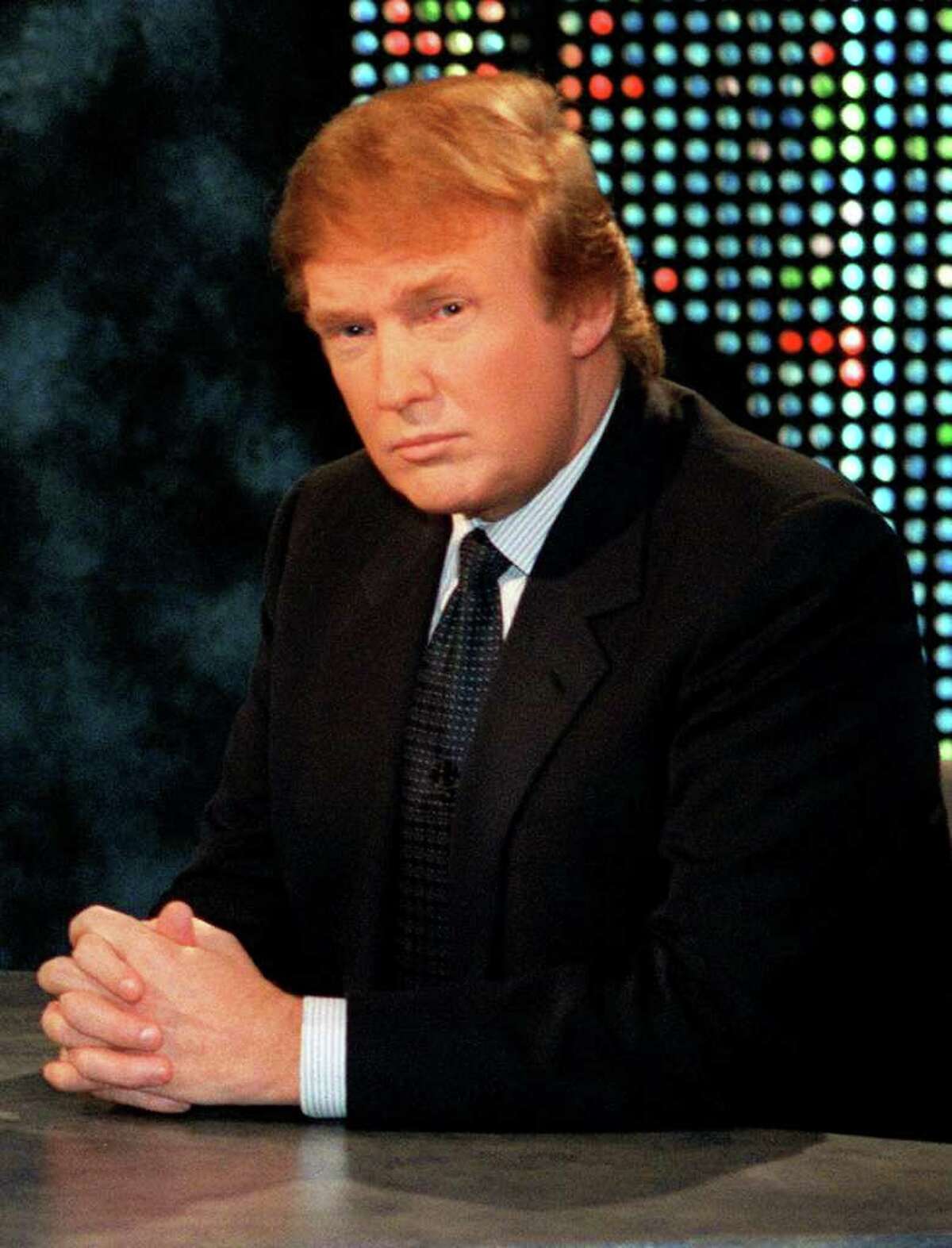 Donald Trump waits to be interviewed by talk show host Larry King during a taping of "Larry King Live," Thursday, Oct, 7, 1999, in New York. Trump said he has formed an exploratory committee to help him determine whether he can win the White House as a Reform Party candidate.
