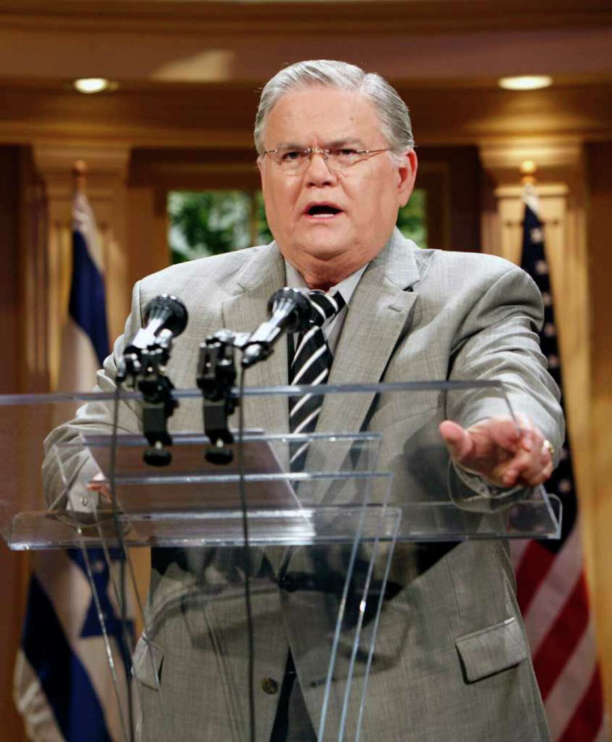 ** FILE ** In this May 23, 2008, file photo the Rev. John Hagee speaks during a news conference at the Cornerstone Church in San Antonio, Texas. Hagee, the internationally known radio/TV evangelist, is recovering after undergoing open heart surgery Thursday, Oct. 2, 2008.