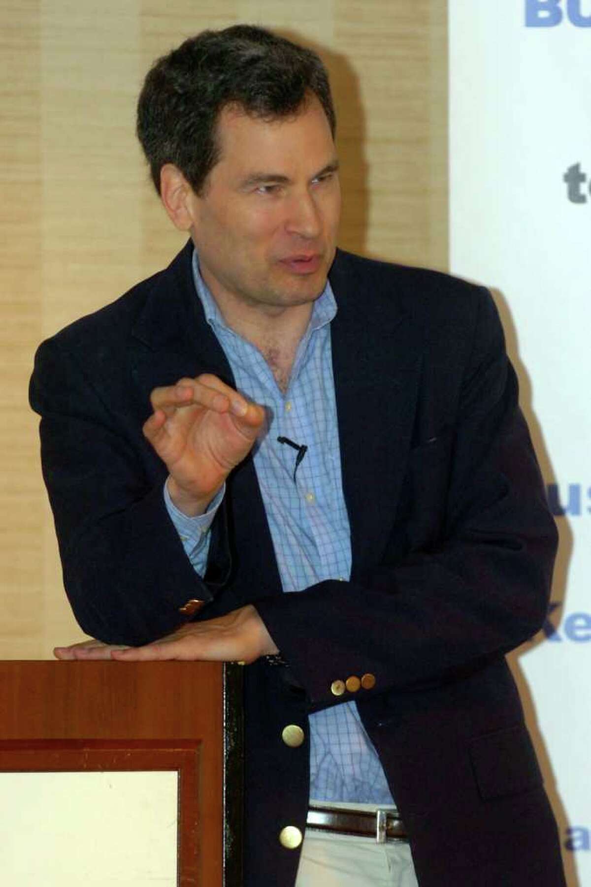 David Pogue, the New York Times technology columnist and CBS News correspondent, speaks at the Technology Today Business Forum at the Courtyard by Marriott in Shelton, Conn. Thursday, May 19th 2011. Pogue and his wife have been charged with disorderly conduct following a domestic dispute Monday at their Westport home that police said turned physical.
