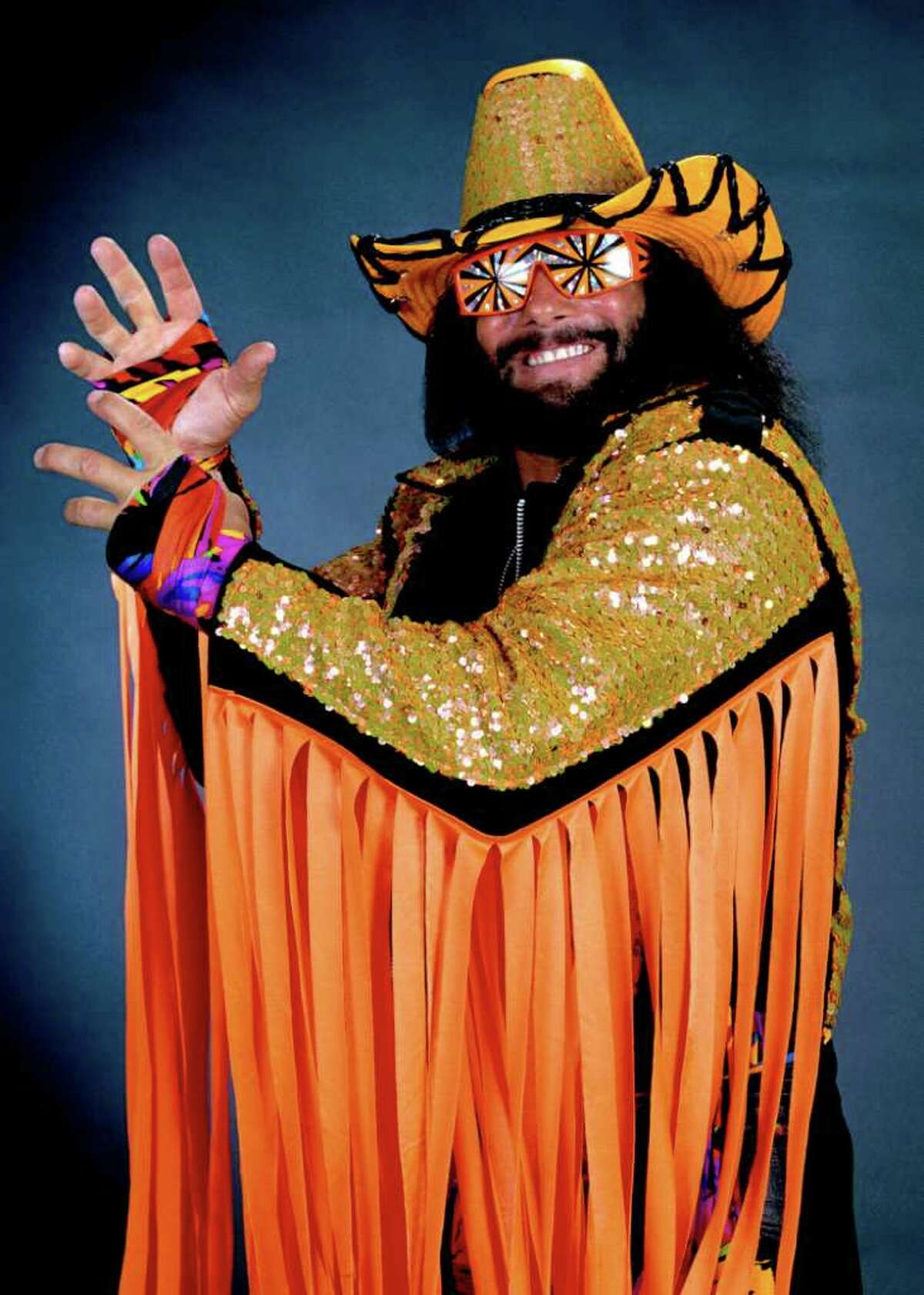 In this undated publicity image released by WWE, professional wrestler Randy "Macho Man" Savage is shown. Savage, whose legal name is Randy Mario Poffo, died in a car crash in Florida on Friday, May 20, 2011, according to a Florida Highway Patrol crash report.