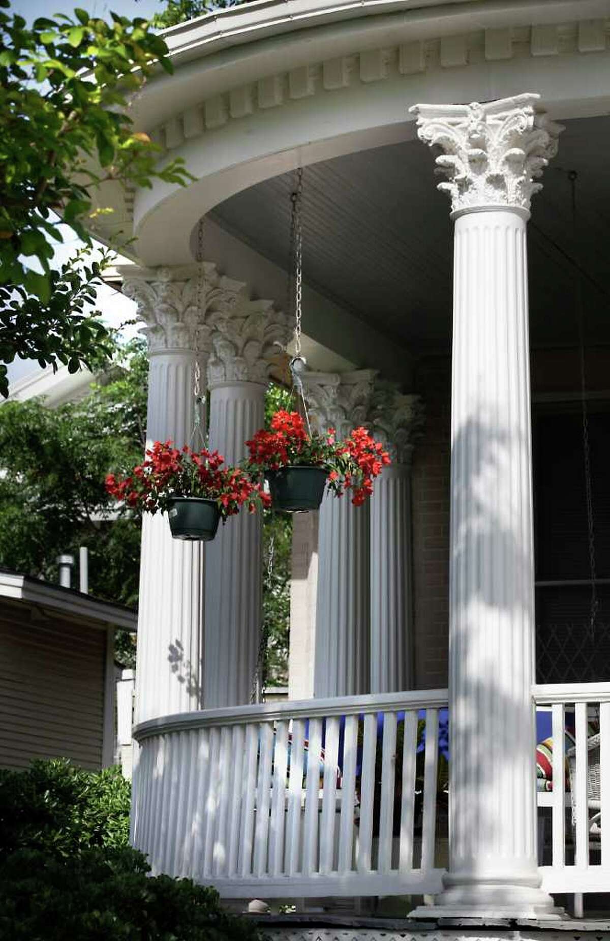 Real Estate - Large ornate columns adorn the circular porch at 805 N. Pine, home of BL Ross, in Dignowity Hill. Monday, May,16, 2011. photo Bob Owen/rowen@express-news.net
