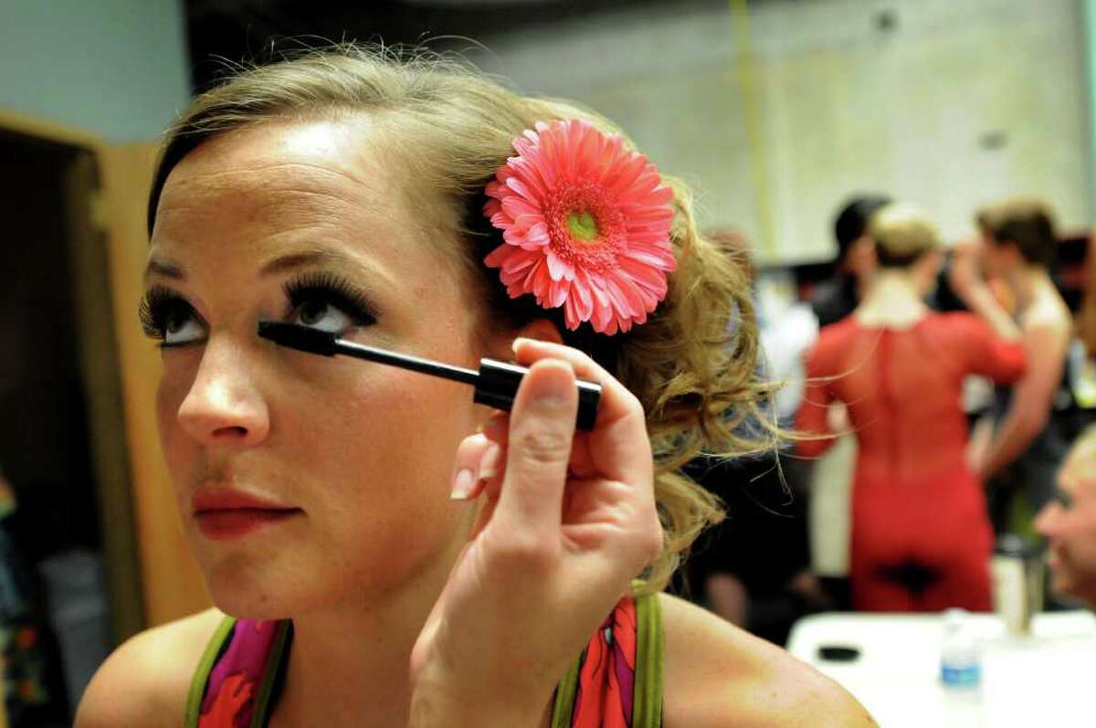 Model Carrie Barown of Albany gets her eyelashes touched up backstage at the Electric City Couture fashion show on Friday, May 20, 2011, at Proctors in Schenectady, N.Y. (Cindy Schultz / Times Union)