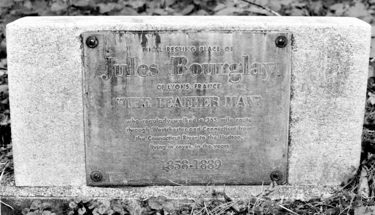 The headstone marking the gravesite of the 19th-century wanderer known as the Leatherman, whose identity is a mystery but who some believed was named Jules Bourglay, is located in Ossining, N.Y.