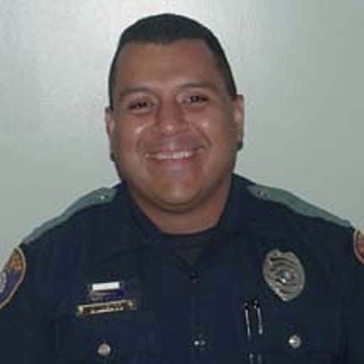 THE OFFICER: Northside Independent School District Police Officer Daniel Alvarado shot and killed a student in the backyard of a house the youth had run to in order to avoid detection.