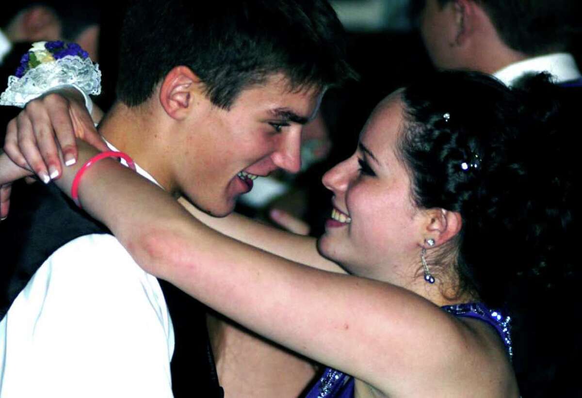 SPECTRUM/Matthew Svinte and Ashlyn Pacific share a special smile as they dance at the New Milford High School senior prom, May 20, 2011 at the Waterview in Monroe.
