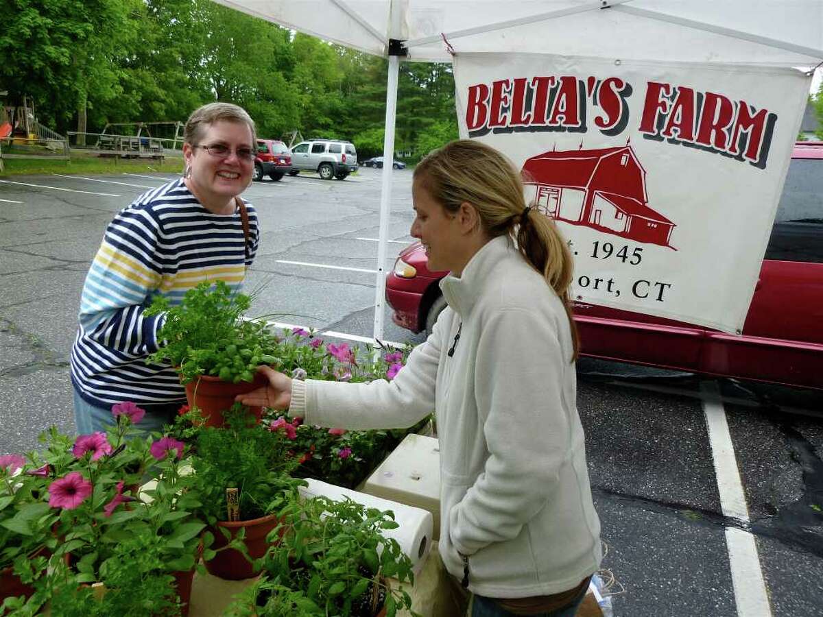 Farmers market springs to life behind Westport church