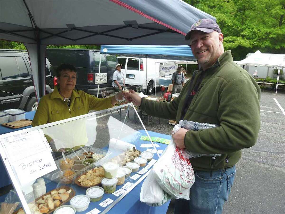 Farmers market springs to life behind Westport church