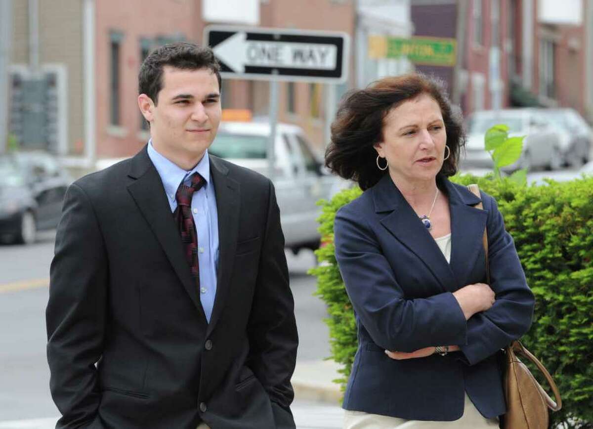Evan Sapio,18, left accompanied by his mother enters Albany, N.Y. City Court May 23, 2011, for his appearance on charges he received in the Kegs and Eggs riot earlier this year.(Skip Dickstein / Times Union)