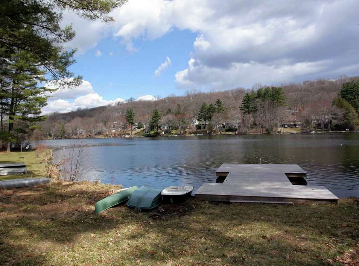 Lakeside colonial offers privacy in serene setting