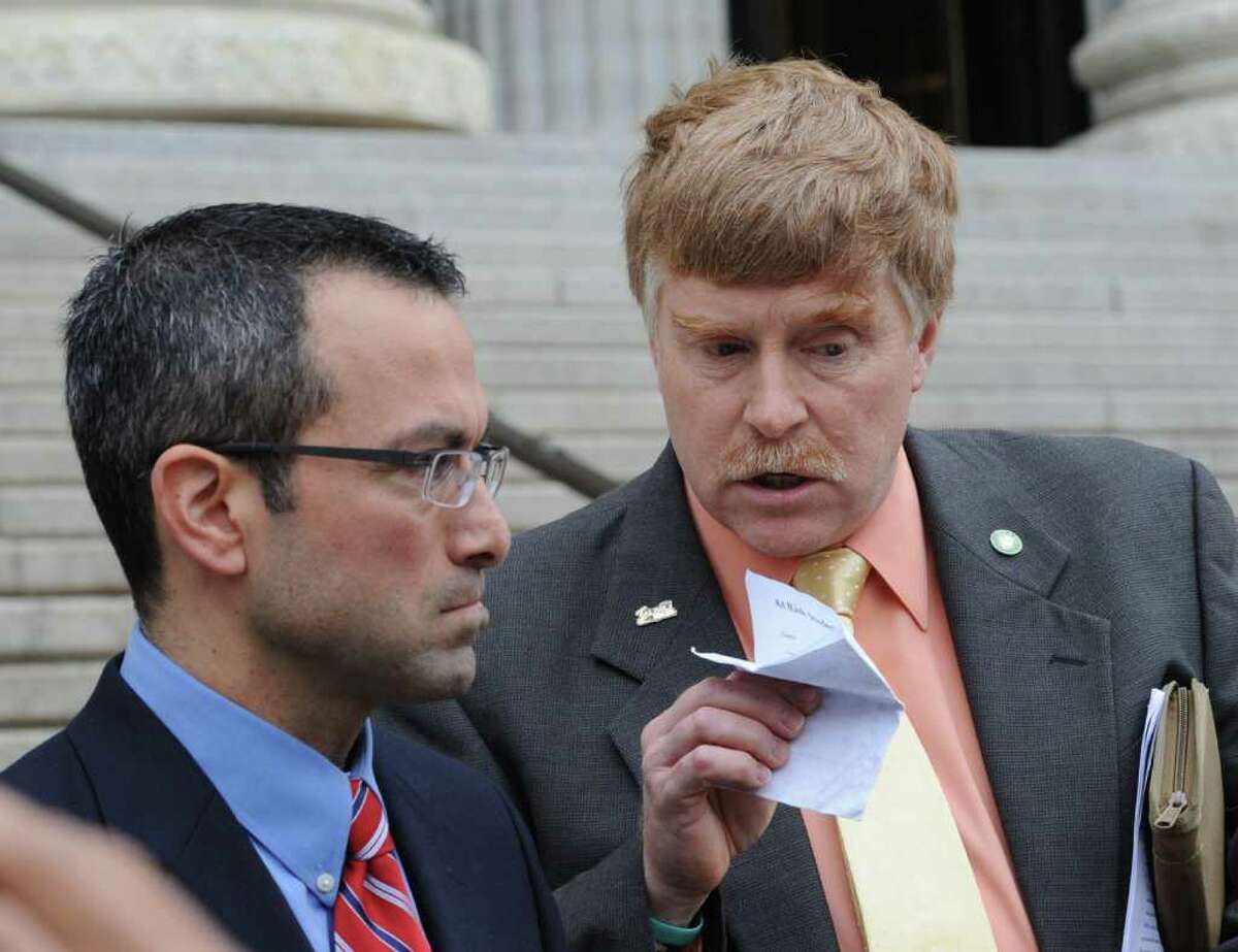 2011 Teacher of the Year Jeff Peneston of Liverpool, N.Y., right is joined by 2008 Teacher of the Year Rich Ognibene, left, on the steps of the NYS Education Building in Albany, N.Y. May 23, 2011 as they prepared to present a letter signed by them and other Teachers of the Year to Board of Regents and Chancellor Tisch sharing their disappointment in the changes in the NYS Education Department's Annual Professional Performance Review system. (Skip Dickstein / Times Union)