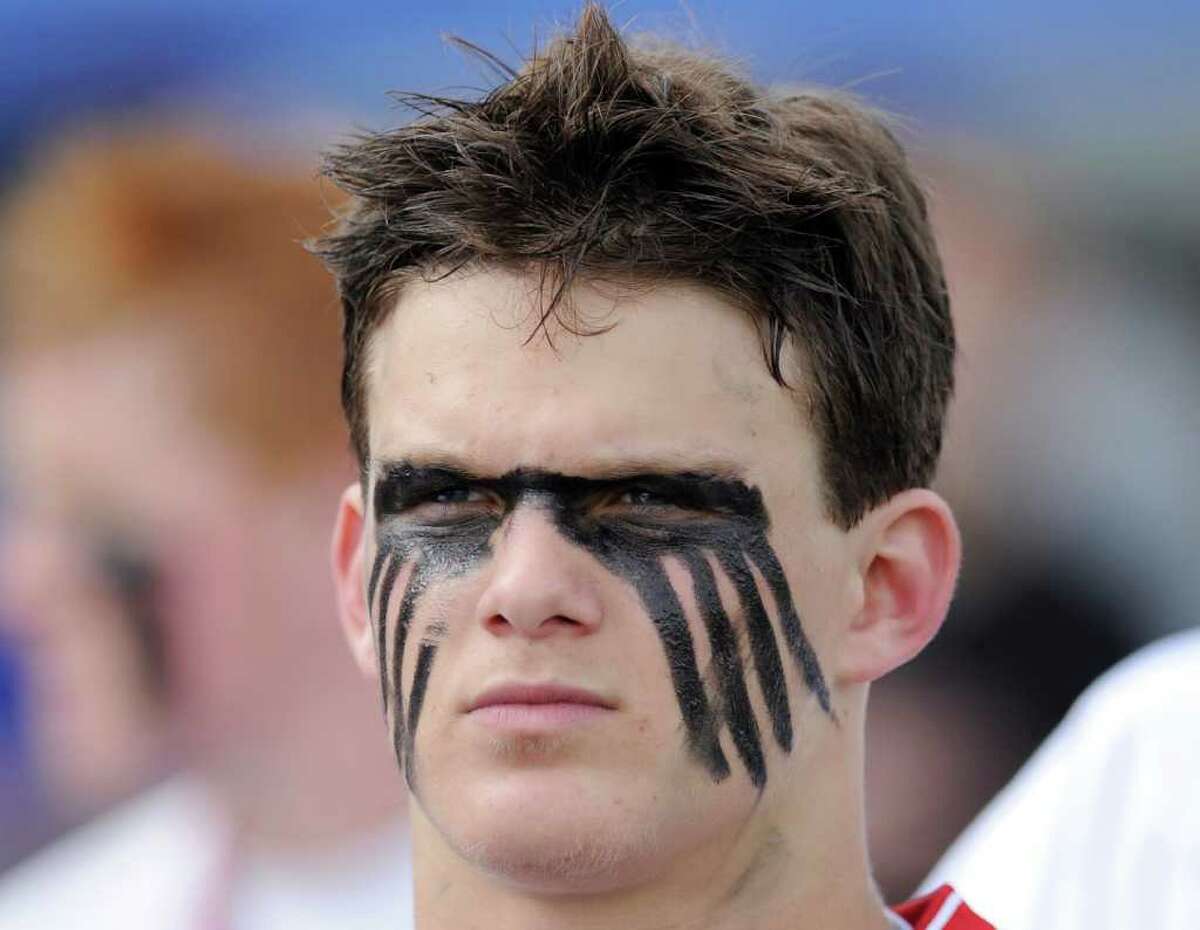 Alex Marcus, # 23 of Greenwich High School, with face painted at the start boys high school FCIAC lacrosse semifinal between Greenwich High School and Ridgefield High School at Brien McMahon High School, Norwalk, Tuesday night, May 24, 2011. Ridgefield defeated Greenwich, 10-4.