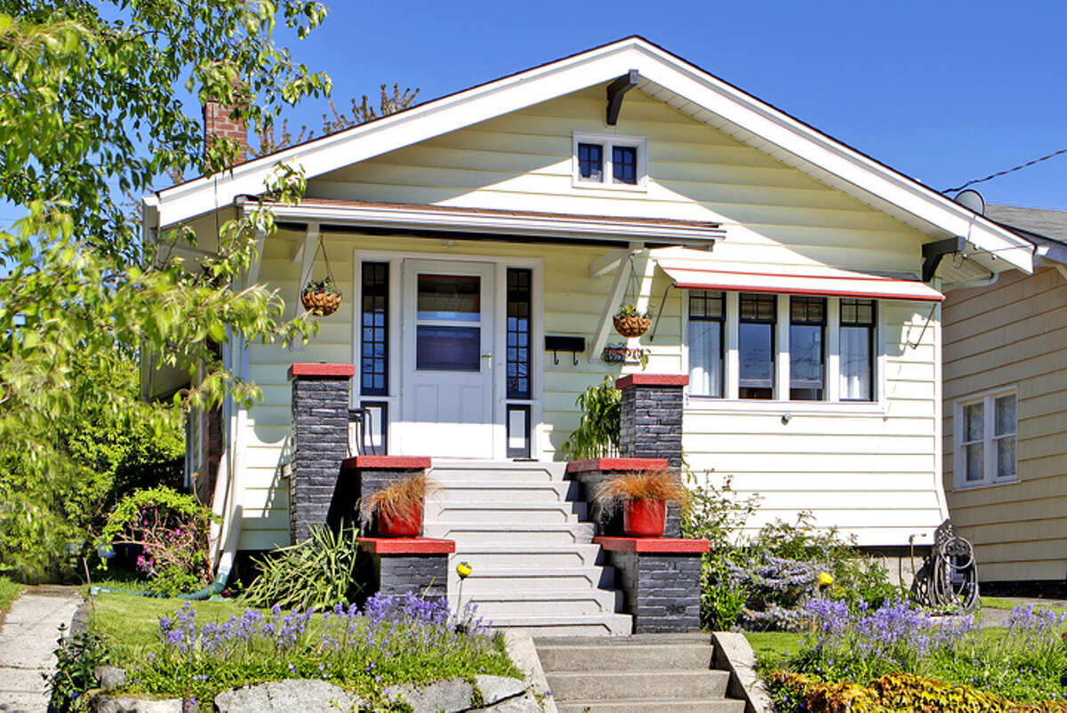 These days, you can find some nice houses in the greater Ballard area for around $350,000. Here are a few, starting with this one at 6526 4th Ave. N.W., listed for $359,950. The 1,600-square-foot house, built in 1907, has two bedrooms, a basement, brick fireplace, cool built-in cabinets and a bathroom remodeled with Travertine tile.