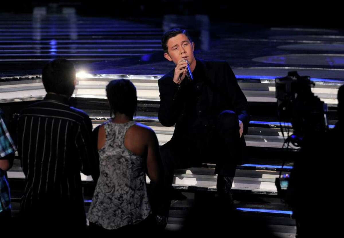 Scotty McCreery performs at the "American Idol" finale on Wednesday, May 25, 2011, in Los Angeles. (AP Photo/Chris Pizzello)