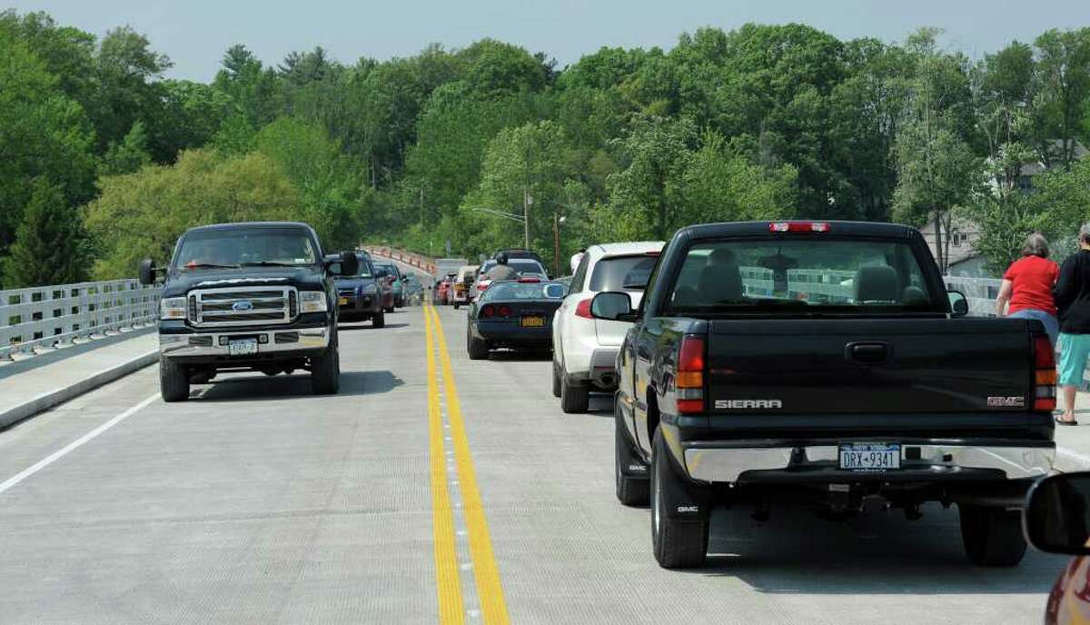 Neighbors and friends of neighbors line up to make the first drive across the bridge at the opening of the Route 9P Bridge at the north end of Saratoga Lake May 26, 2011. (Skip Dickstein / Times Union)