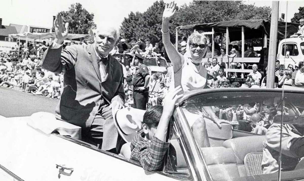 In this photo courtesy of the Bridgeport History Center at the Bridgeport Public Library, then Congressman Thomas J. Dodd rides in a parade with his wife Grace Murphy Dodd in 1955.