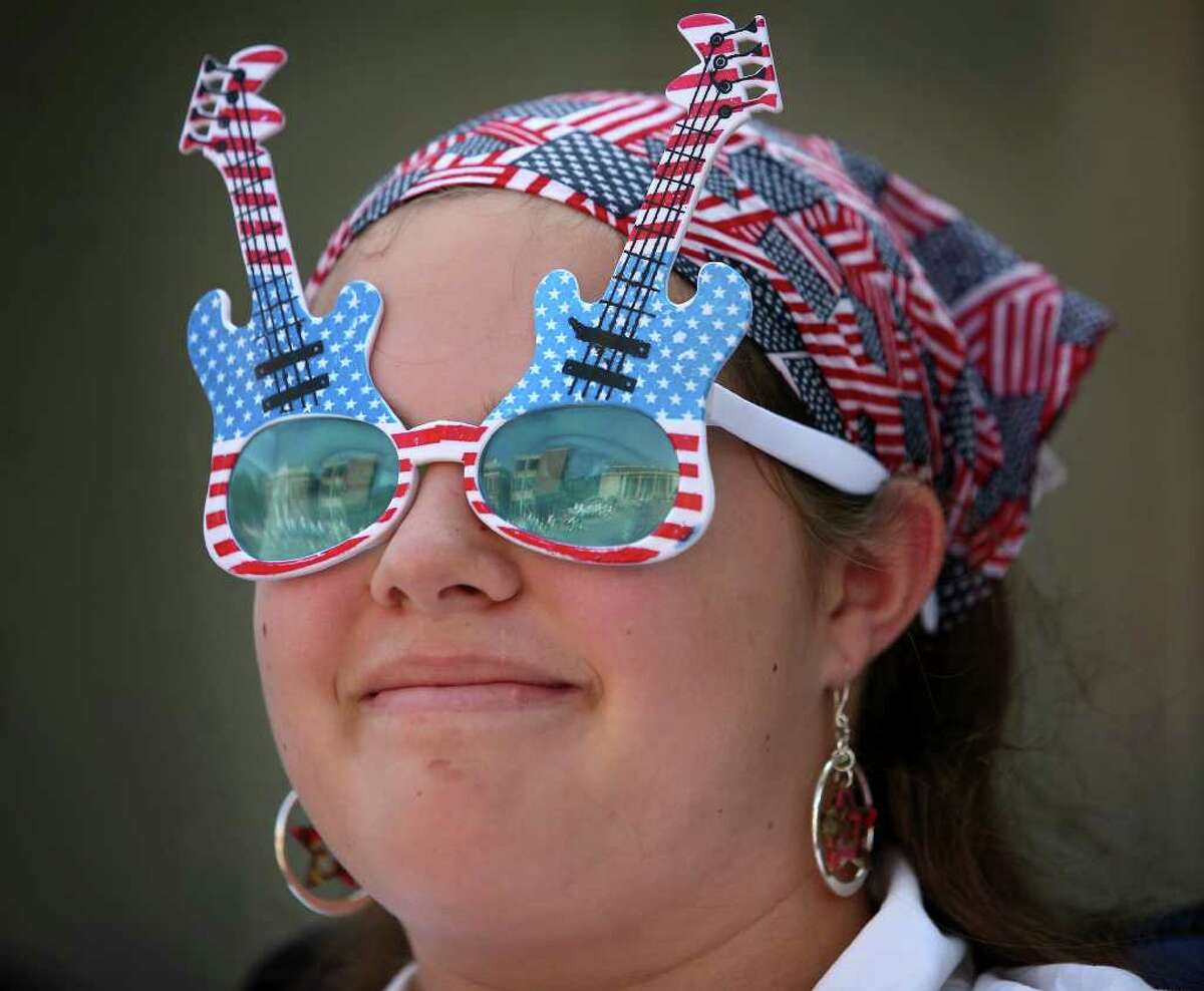Makayla Eaton, 13 of Ansonia, shows off her patriotic spirit at the annual Memorial Day Parade in downtown Ansonia on Sunday, May 29, 2011.