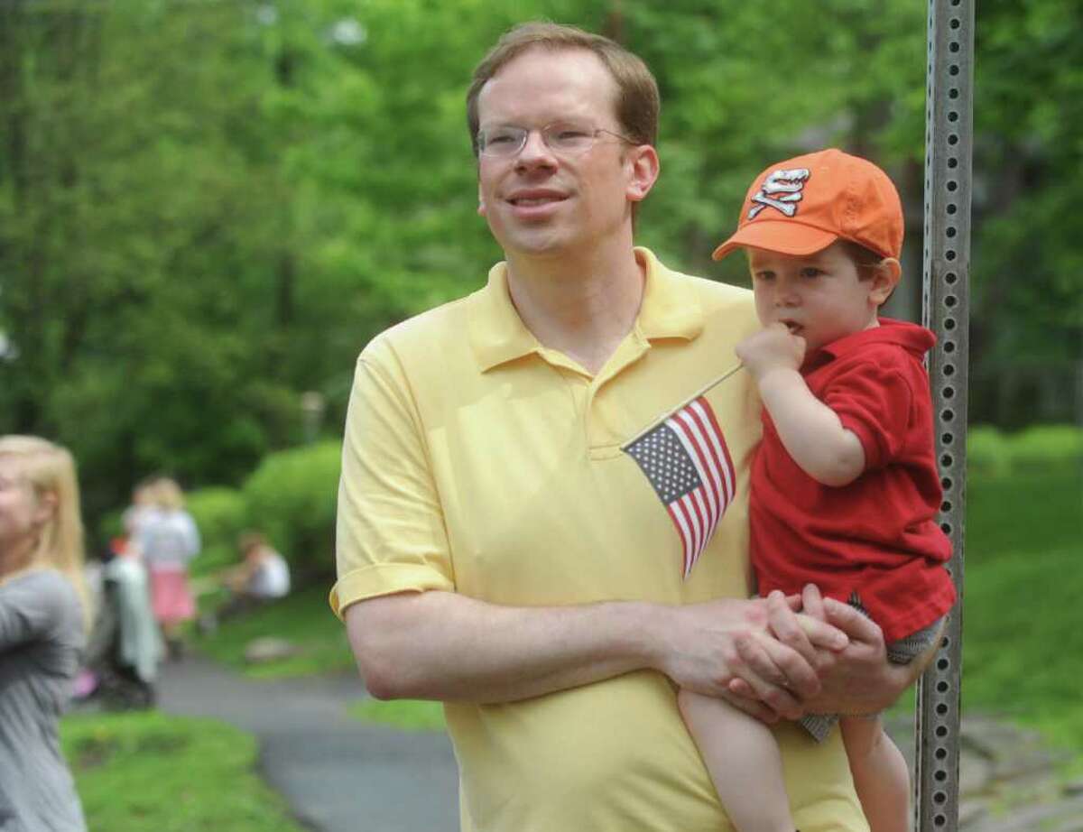 Stephen Smith with his son Spencer, 1, at the Old Greenwich Memorial Day Parade down Sound Beach Avenue on Monday, May 30, 2011.