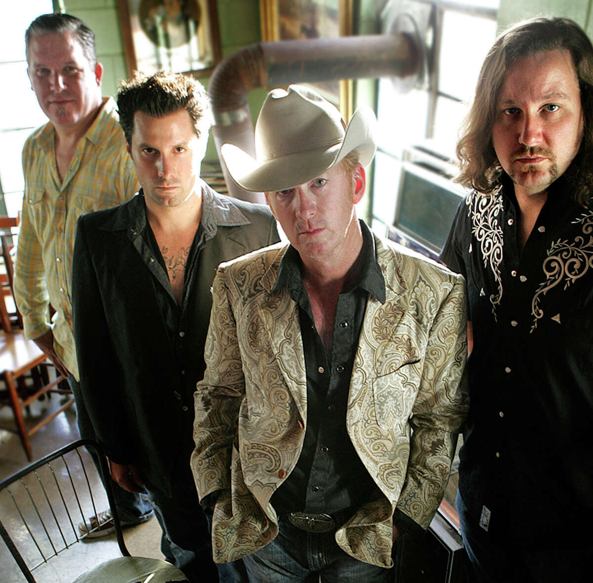 Two Tons of Steel -- Dennis Fallon (from left), Chris Roades, Kevin Geil and Chris Dodd -- has released a new CD, "Not That Lucky."