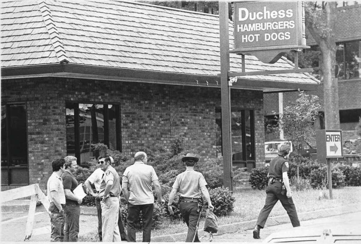 Unsolved police killing haunts Darien department