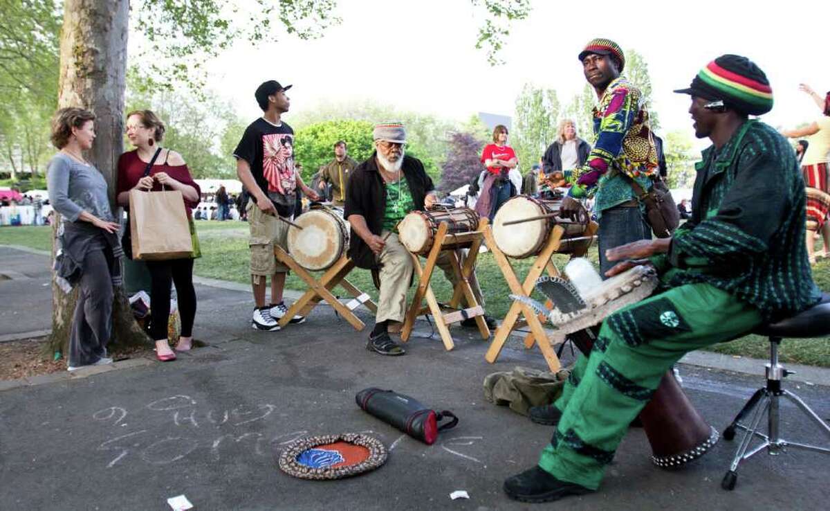 Dounia Djembe Drum and Dance performs at the Northwest Folklife Festival, on Monday.