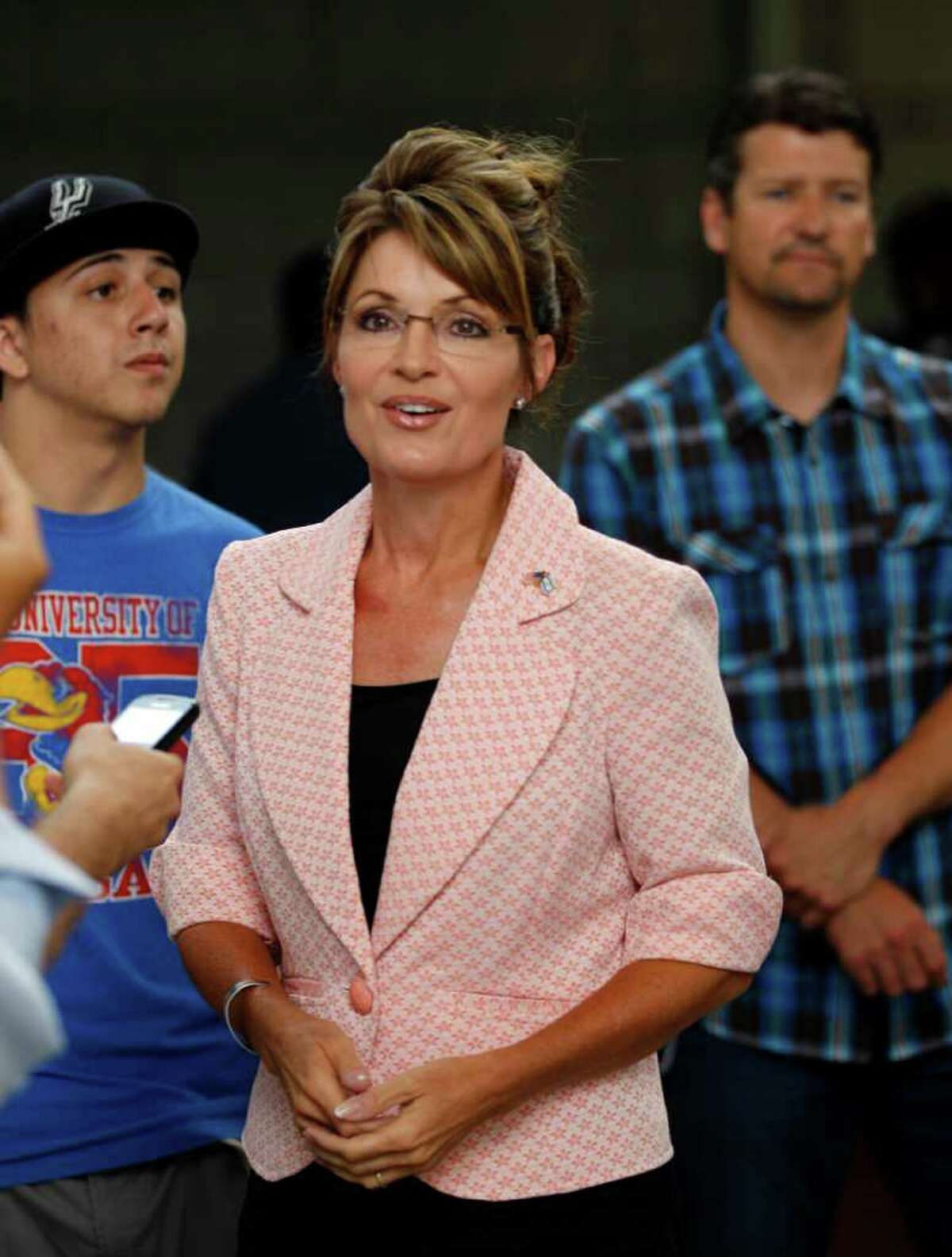 Sarah Palin is accompanied by her husband Todd (right) during a 2011 visit to Independence National Historical Park  in Philadelphia.