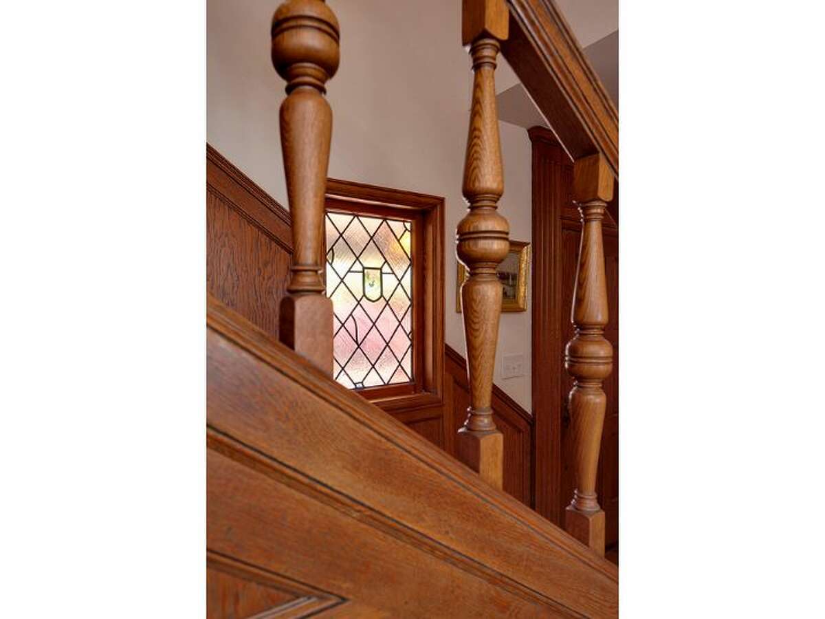 Staircase and unique window.