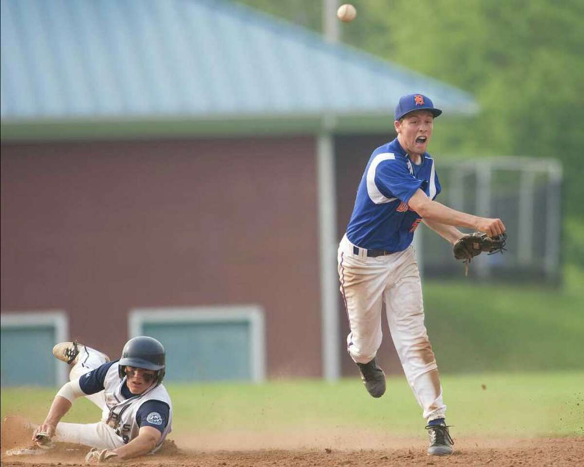 Danbury's Robbie Meerman, after pitching six innings, moved to shortstop in the seventh and turned a double play against Staples in the Class LL state tournament second round game Wednesday at Danbury High School.