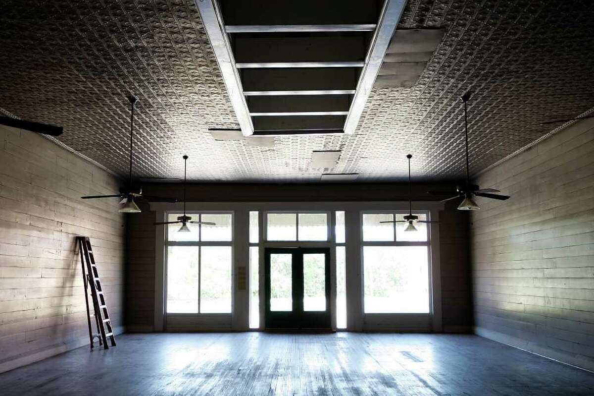 Light shines through the windows of the former Crook store in Martindale. The building has undergone refurbishing by Carlton Carl. According to the Handbook of Texas, Martindale at its height had four mercantile stores.