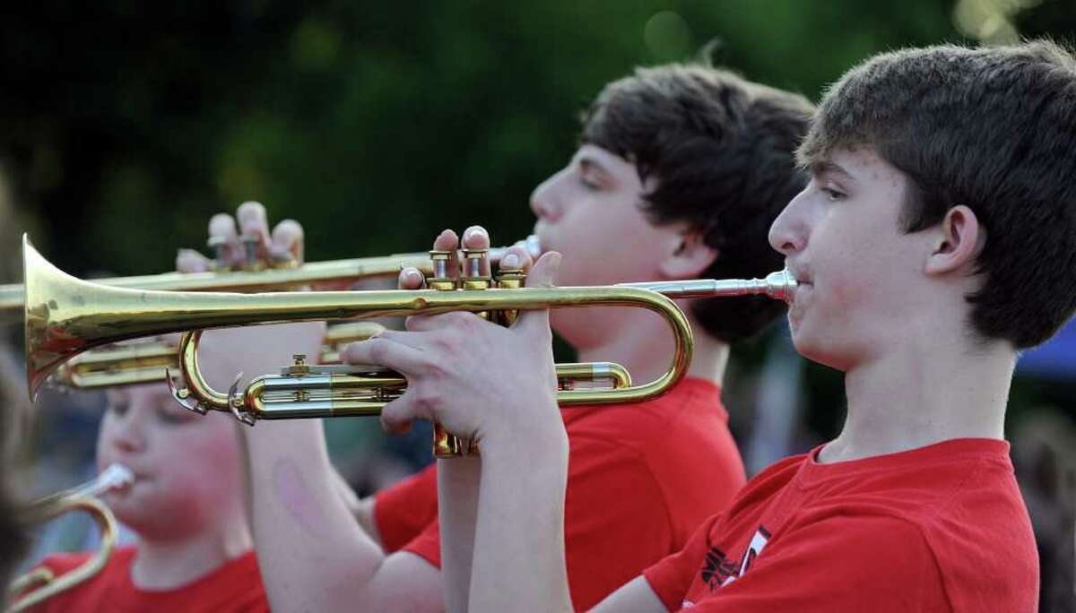 Nathaniel Diamond, left, and Steven Kats, both 13, play trumpets during a rendition of "The Star Spangled Banner" Tuesday evening during "The Big Band Bash." Photo taken Tuesday, May 31, 2011.