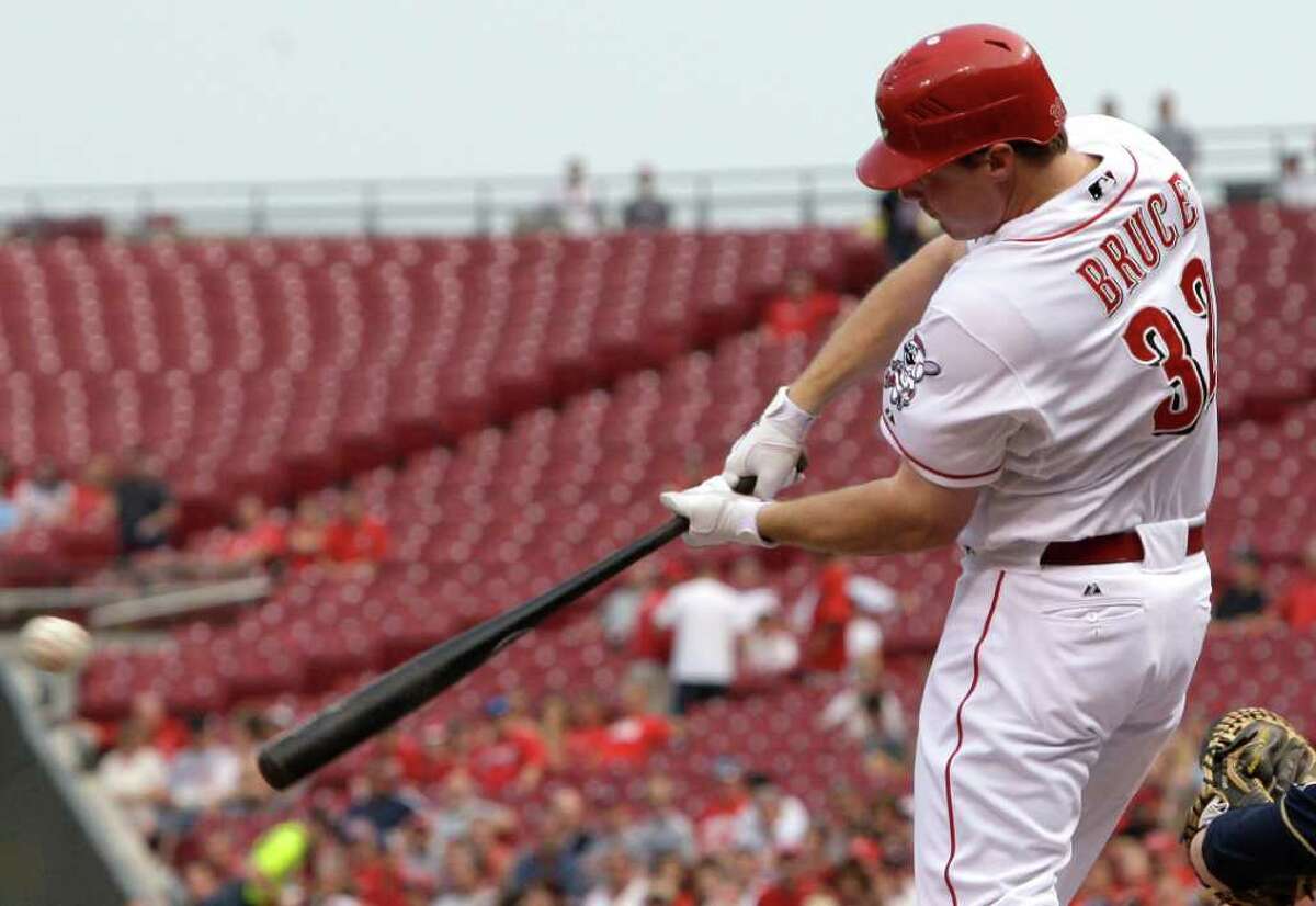 Cincinnati Reds' Jay Bruce gets a hit off Milwaukee Brewers starting pitcher Zack Greinke to drive in a run in the first inning of a baseball game, Tuesday, May 31, 2011, in Cincinnati. (AP Photo/Al Behrman)