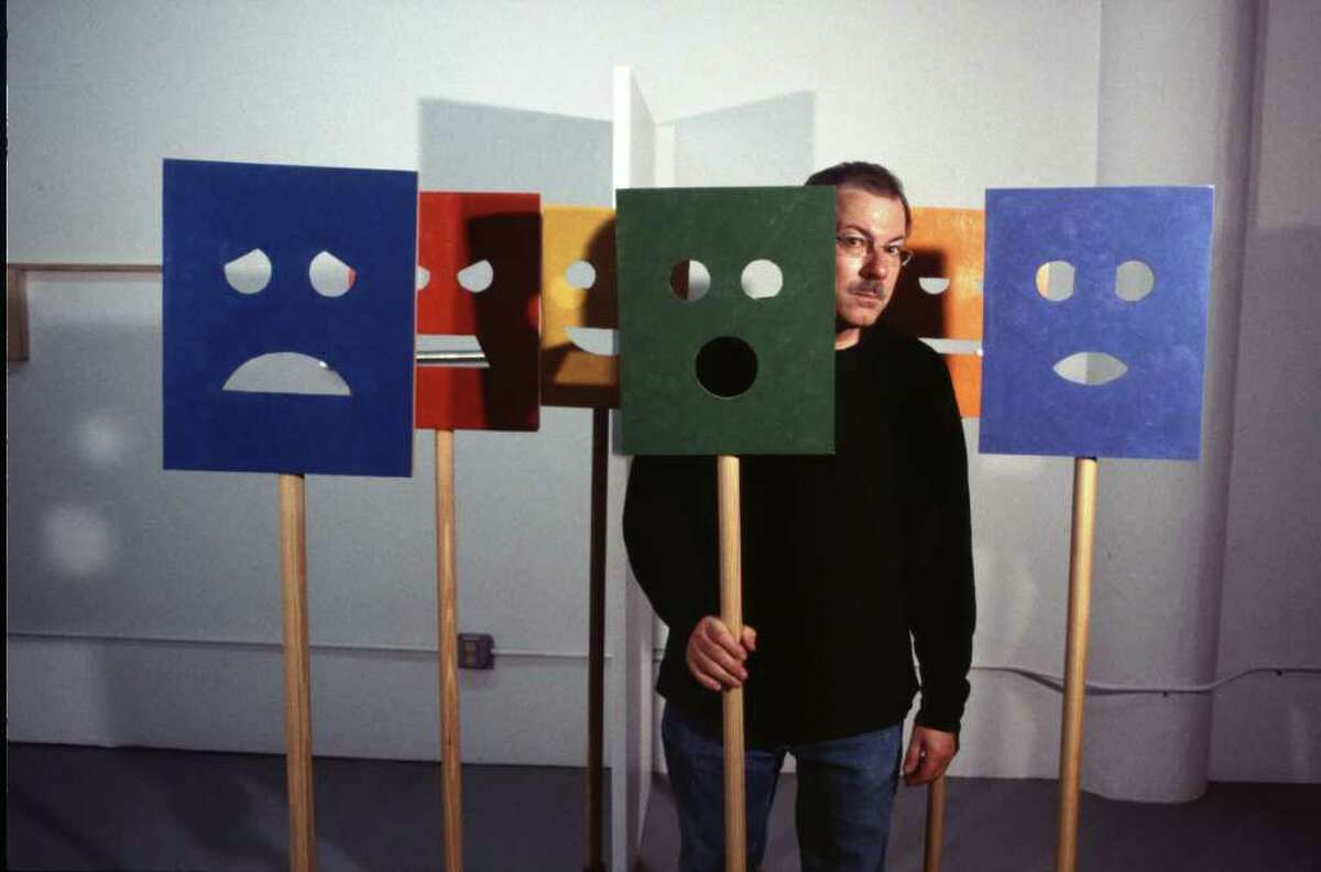 A Bob Gregson retrospective, "Just a Phase," will be featured June 16 through July 30 at Bridgeport's City Lights Gallery. Here, Gregson is shown with "Masks" from 2004.