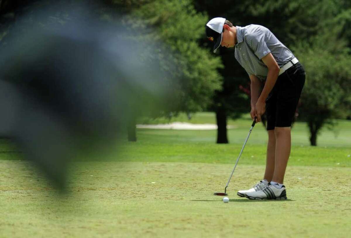 Greenwich's Danny Guise putts on the first hole during the FCIAC championship golf tournament Thursday, June 2, 2011 at Fairchild Wheeler Golf Course in Fairfield, Conn.