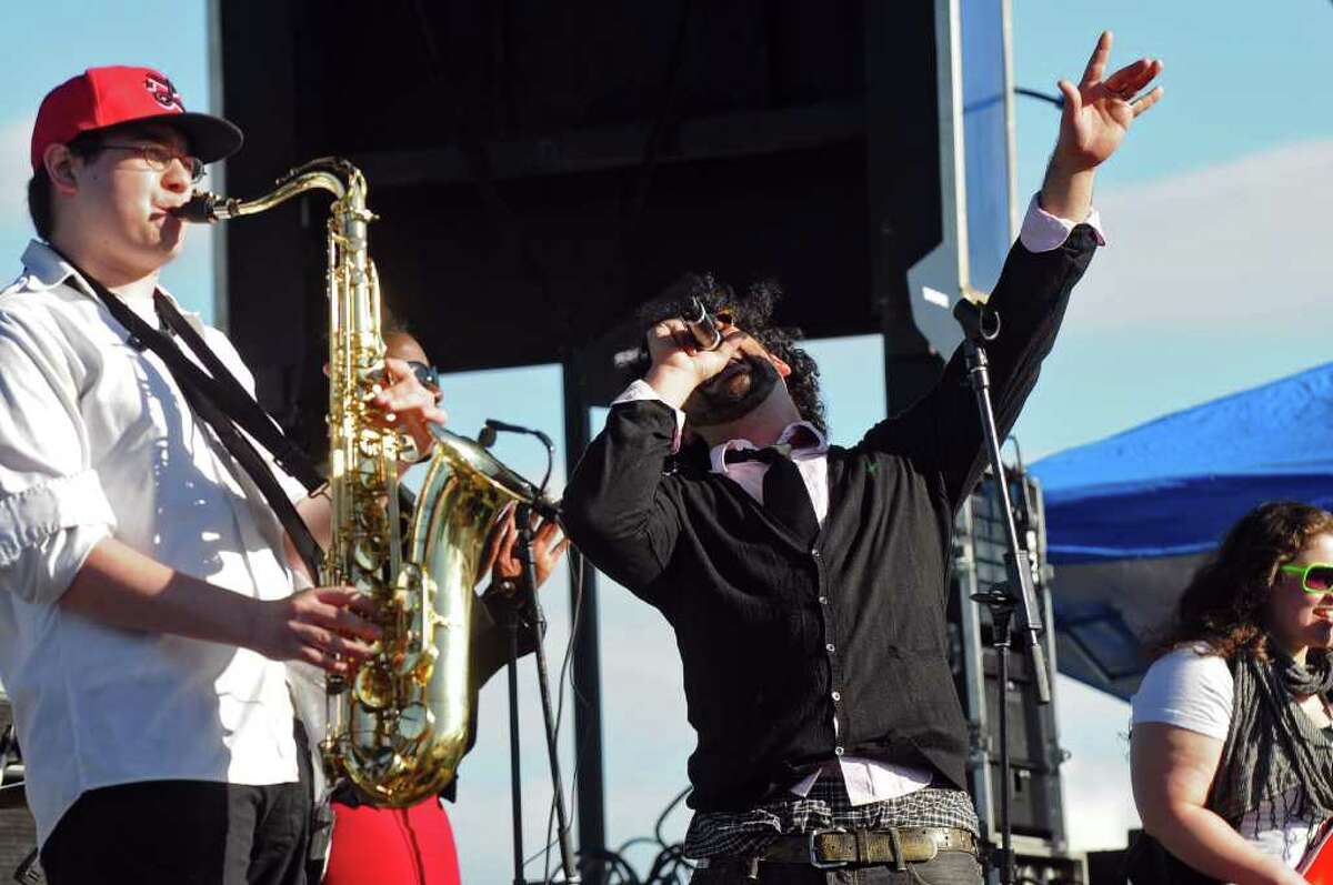 Mirk lead singer Joshua "Mirk" Mirsky, right, sings with saxophone player Chris Russell in the Corning Preserve during Alive at Five on Thursday evening June 2, 2011 in Albany, NY. Mirk opened for Vertical Horizon. ( Philip Kamrass / Times Union)