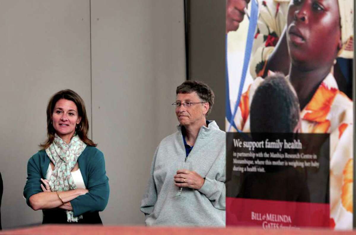Melinda Gates, left, and husband Bill Gates wait to speak at the opening reception of the Bill & Melinda Gates Foundation Thursday, June 2, 2011, in Seattle. Back from a family planning summit in London, Melinda Gates quips:  "Bill is the lead on polio.  I'm the lead on maternity and child health."