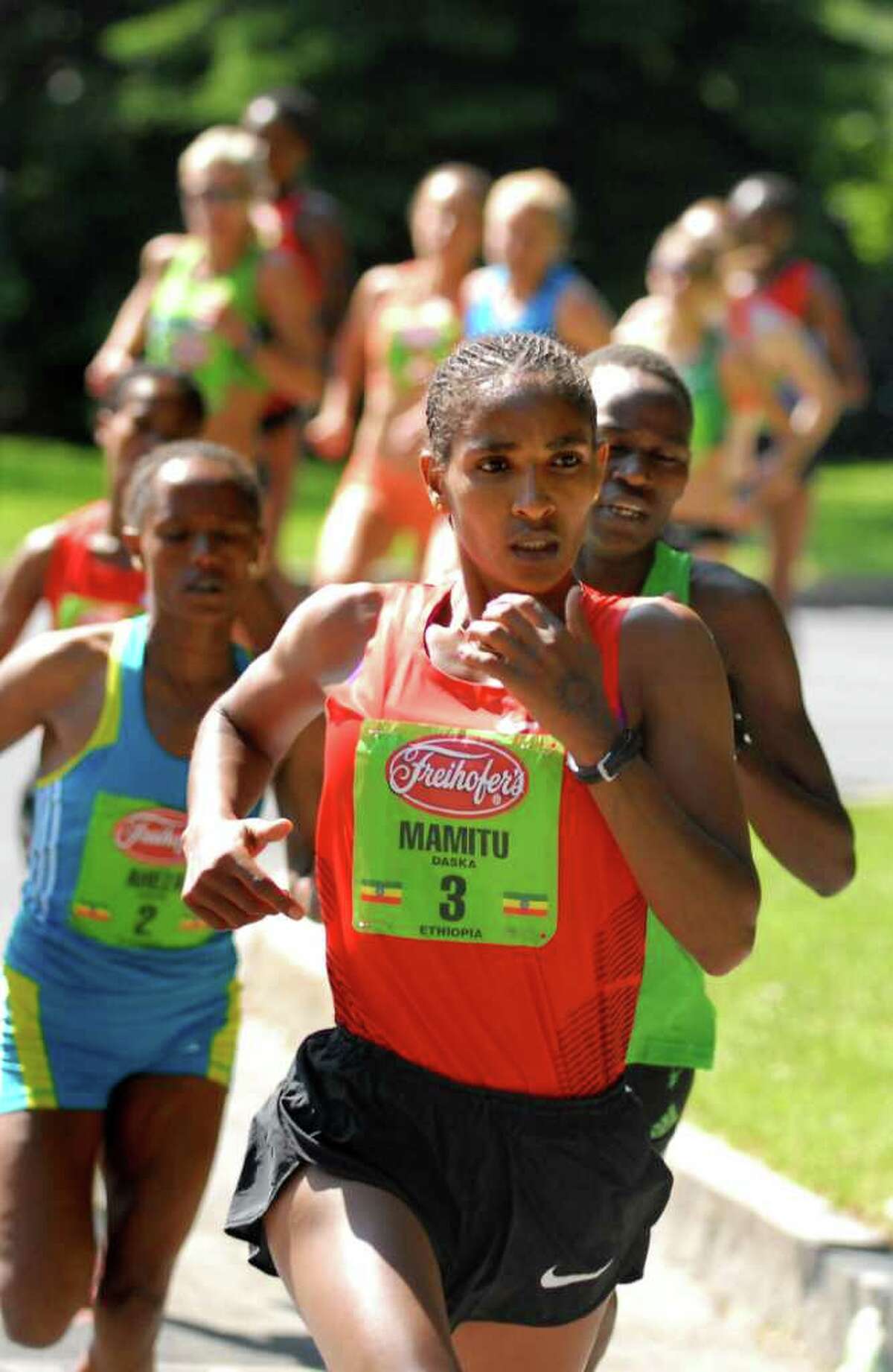 Mamitu Daska (3) of Ethiopia runs in the lead, followed by Emily Chebet and Aheza Kiros during Freihofer's 33rd Run for Women on Saturday, June 4, 2011, in Albany, N.Y. (Cindy Schultz / Times Union)
