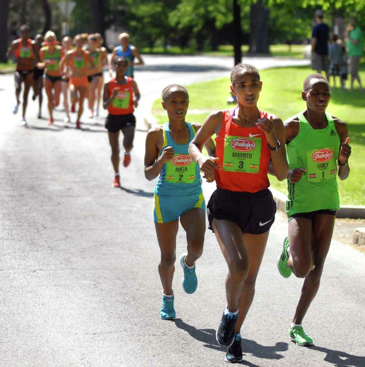 Mamitu Daska (3) of Ethiopia runs in the lead, followed by Emily Chebet (1) and Aheza Kiros (2) in Washington Park during Freihofer's 33rd Run for Women on Saturday, June 4, 2011, in Albany, N.Y. (Cindy Schultz / Times Union)
