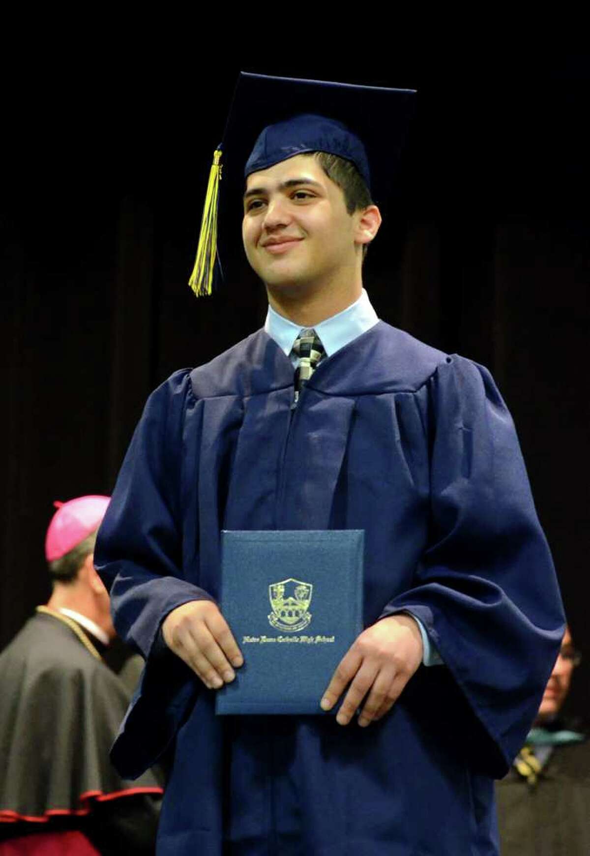 Scott Barrese holds his diploma during the 2011 Notre Dame Catholic High School Commencement at Notre Dame in Fairfield on Saturday, June 4, 2011.