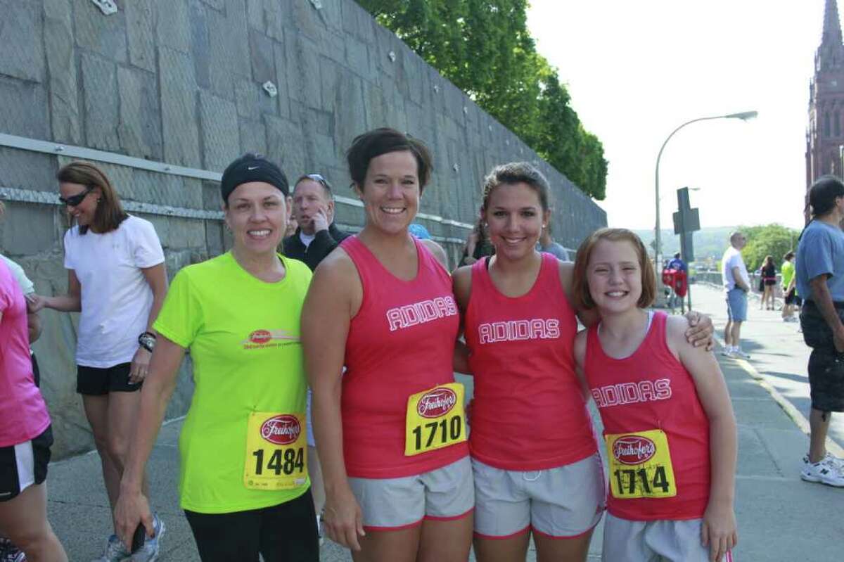Runners before the Freihofer's Run at the Empire State Plaza on Saturday, June 4 2011.