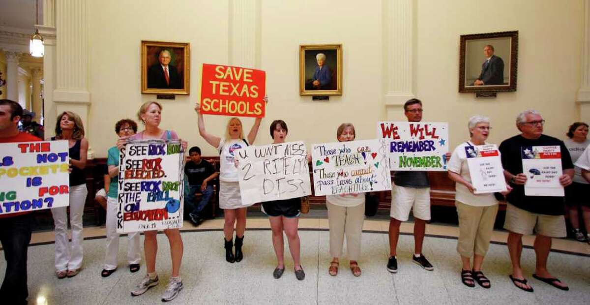 Protesters against cuts in funding for Texas public schools rally in the rotunda in the state capitol, Saturday, June 4, 2011, in Austin, Texas. Teachers are rallying at the Capitol as a bill to slash $4 billion for Texas public schools inched closer to passage during the special legislative session. (AP Photo/Eric Gay)