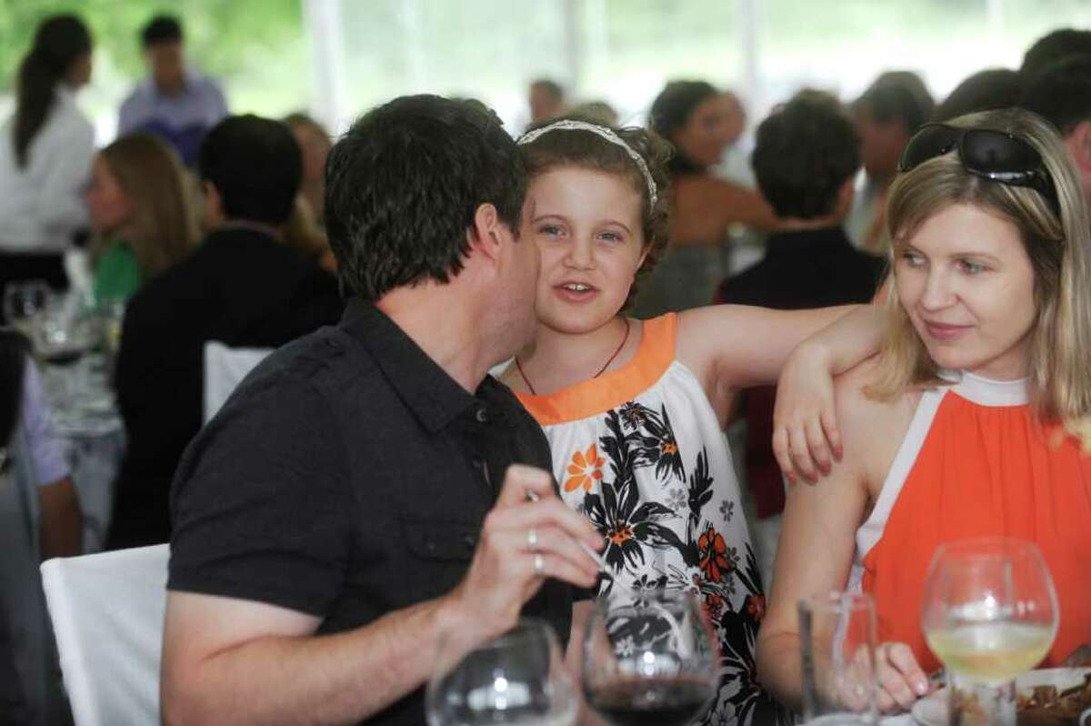 David, his daughter Lily, 8, who as been a camper in the Hole on the Wall Camp, and his wife Natasha at the Hole in the Wall Gang Camp's 10th annual Polo for Children benefit on Sunday, June 5, 2011.