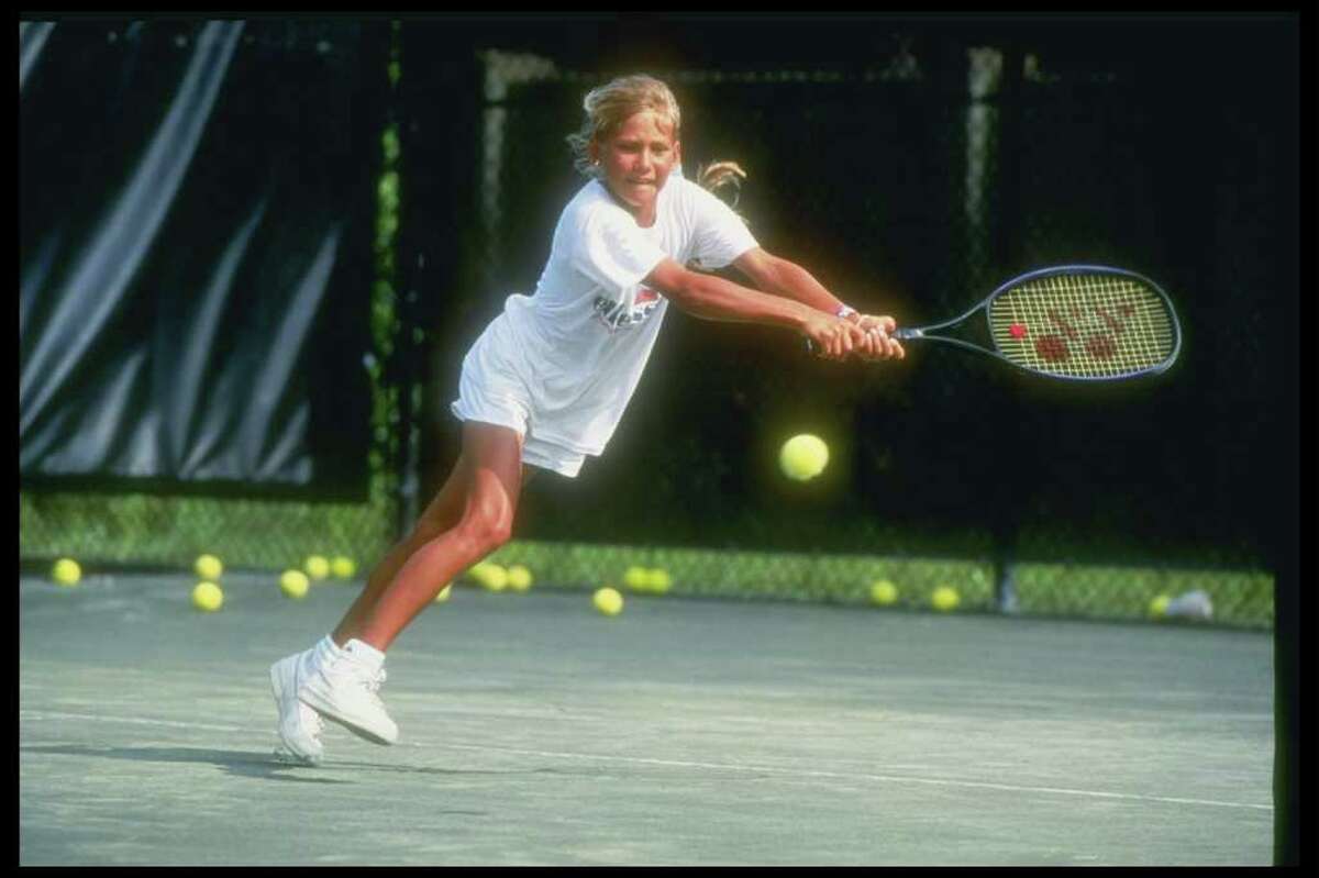 Kournikova started playing tennis at 5 and entering tournaments at 8. At 10, she signed a management deal and went to Bradenton, Fla. to train at Nick Bolletierri Tennis Academy. That's where she's pictured here, at 10, in April 1992.