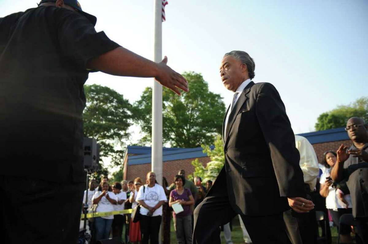 Rev. Al Sharpton takes the stage during the NAACP "Equal Education for All" rally at Brookside Elementary School in Norwalk, Conn., Tuesday, June 7, 2011. The rally was in support of Tanya McDowell, a homeless woman from Bridgeport, Conn., arrested for enrolling her child at Brookside, a Norwalk, Conn., school.